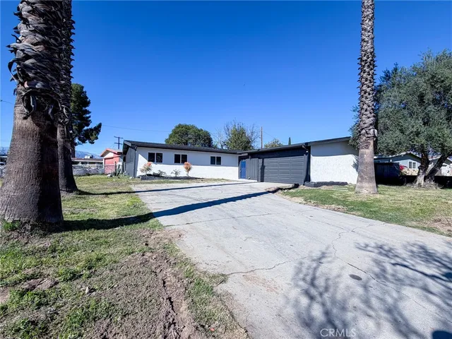 a house view with a garden space