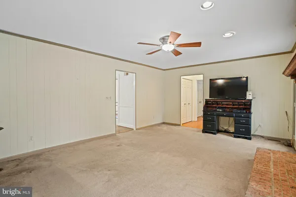 a view of a livingroom with wooden floor