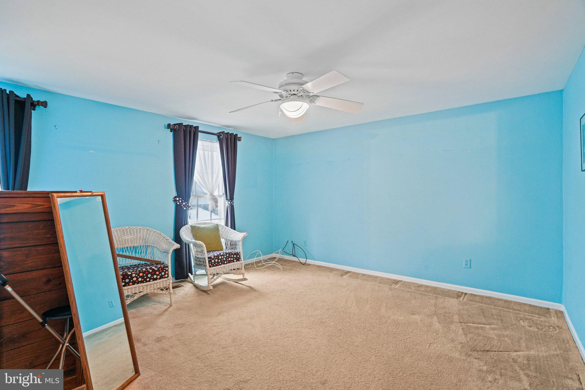 12737 Triple Crown Road Gaithersburg, MD 20878 - Photo 25 of 61 a room with furniture and a window