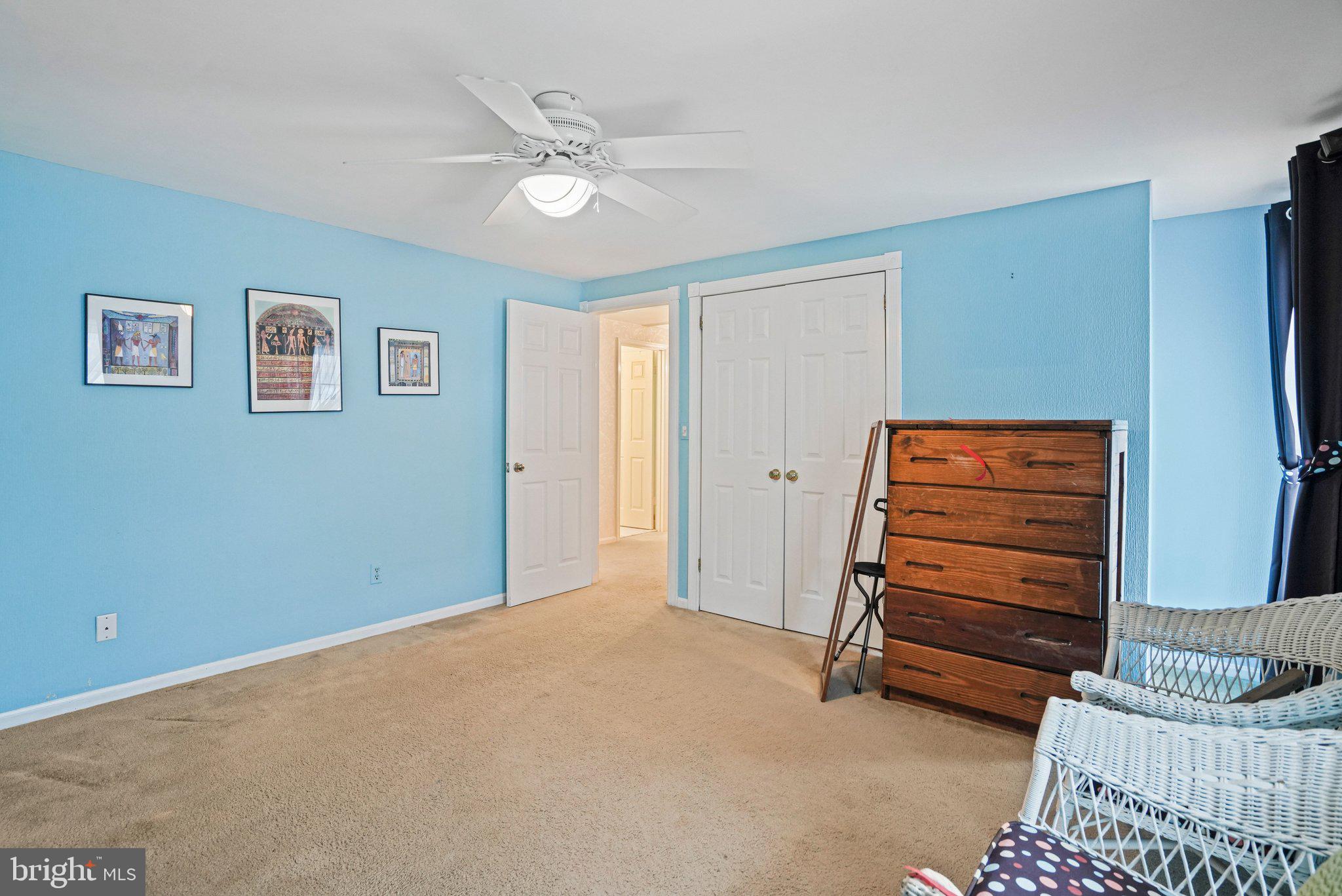 12737 Triple Crown Road Gaithersburg, MD 20878 - Photo 26 of 61 a view of room with stairs and a couch