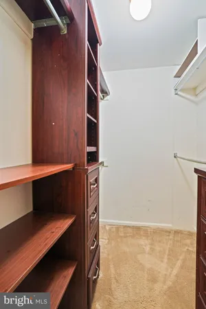 a bedroom with bed and window