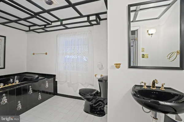 a pathway of a house with a yard