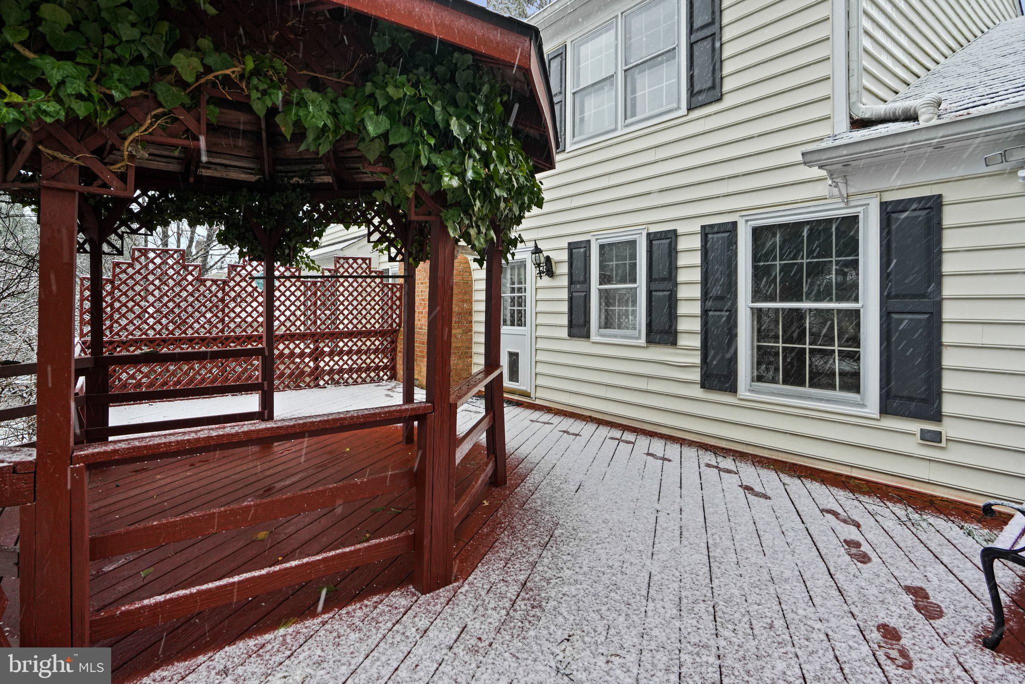 12737 Triple Crown Road Gaithersburg, MD 20878 - Photo 51 of 61 a view of a house with a large window