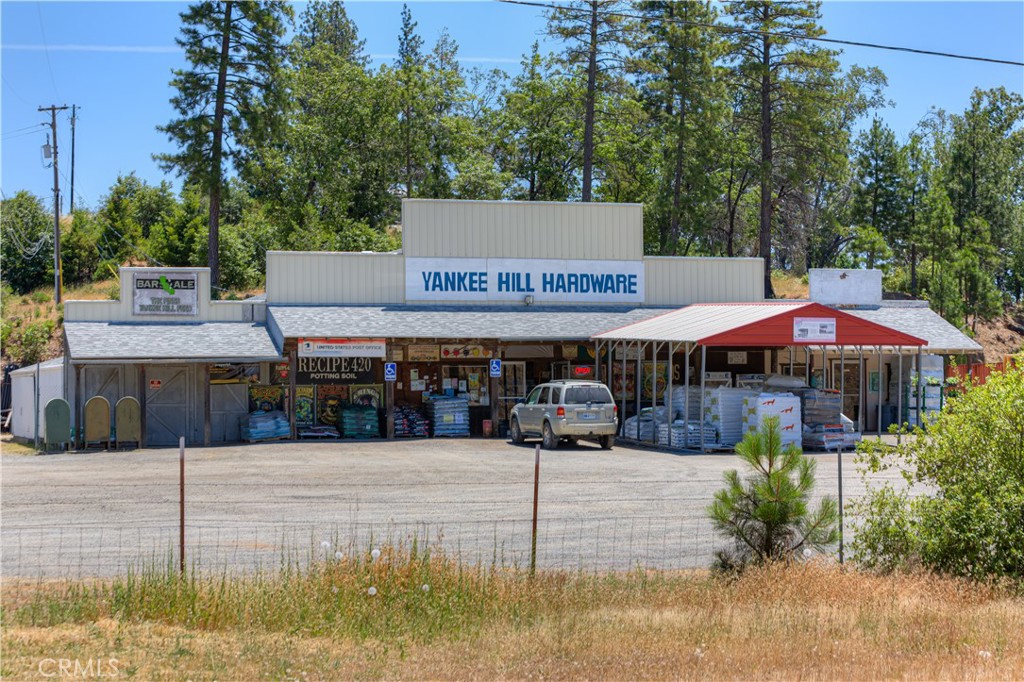 12059 Andy Mountain Road Oroville, CA 95965 - Photo 16 of 18 a view of a house with swimming pool