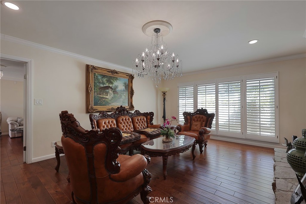 2441 Terraza Place Fullerton, CA 92835 - Photo 11 of 61 a living room with furniture and wooden floor