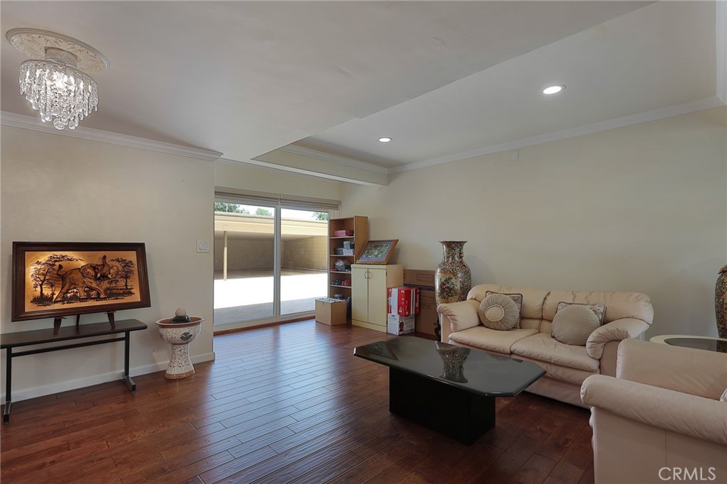 2441 Terraza Place Fullerton, CA 92835 - Photo 15 of 61 a living room with furniture and a flat screen tv