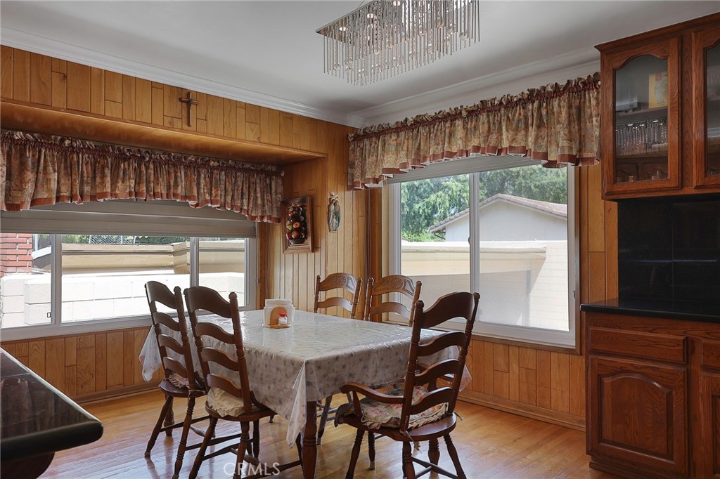 2441 Terraza Place Fullerton, CA 92835 - Photo 20 of 61 a view of a dining room with furniture window and wooden floor