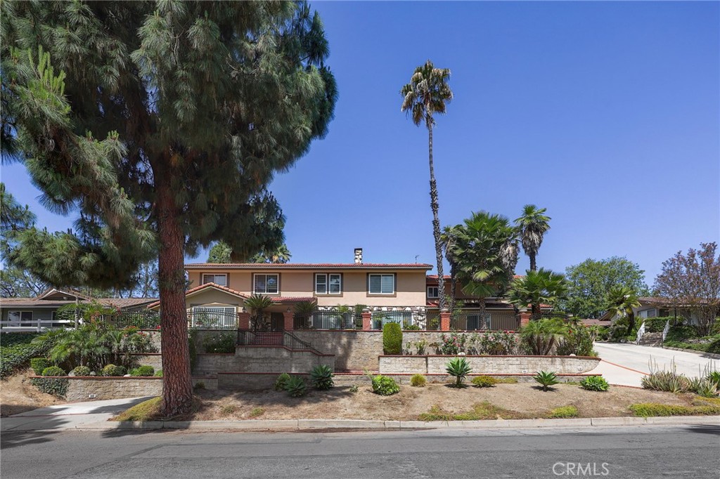 2441 Terraza Place Fullerton, CA 92835 - Photo 2 of 61 a view of a town with palm trees
