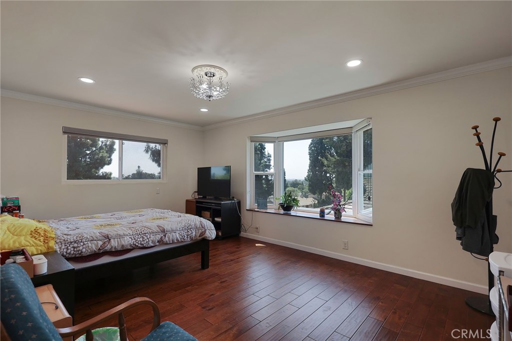 2441 Terraza Place Fullerton, CA 92835 - Photo 43 of 61 a bedroom with furniture and a window