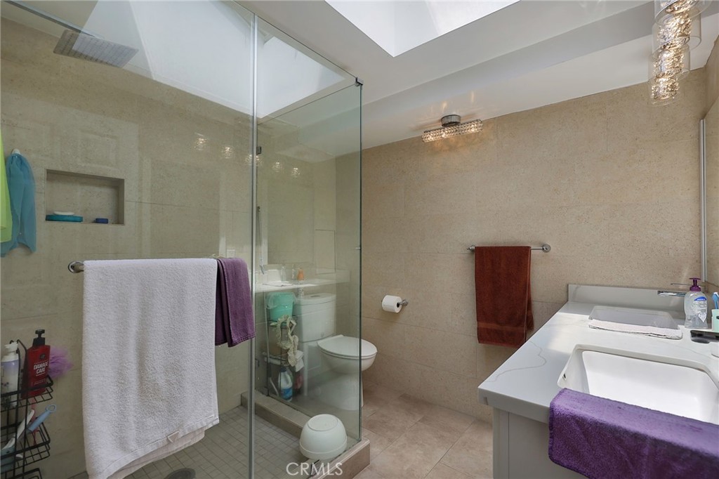 2441 Terraza Place Fullerton, CA 92835 - Photo 44 of 61 a bathroom with a sink toilet and shower
