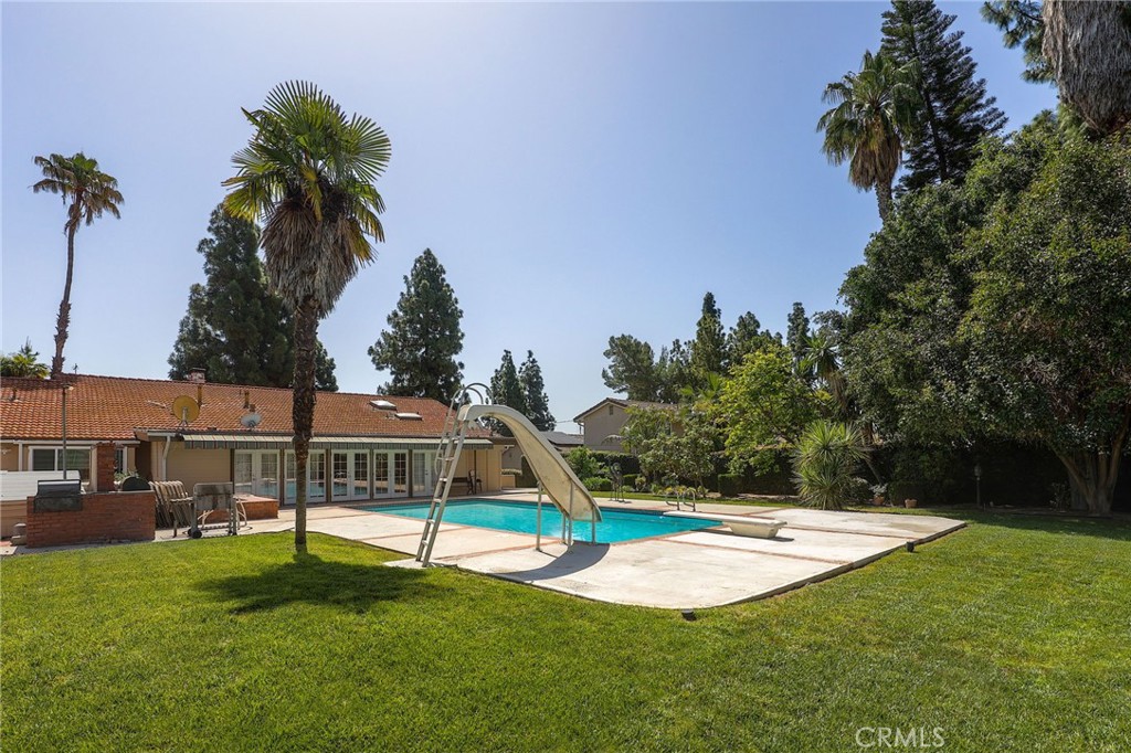 2441 Terraza Place Fullerton, CA 92835 - Photo 50 of 61 a view of a garden with a slide