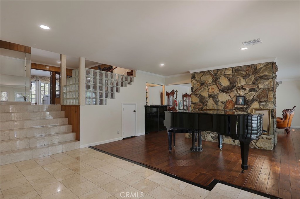 2441 Terraza Place Fullerton, CA 92835 - Photo 8 of 61 a view of a livingroom with furniture and wooden floor