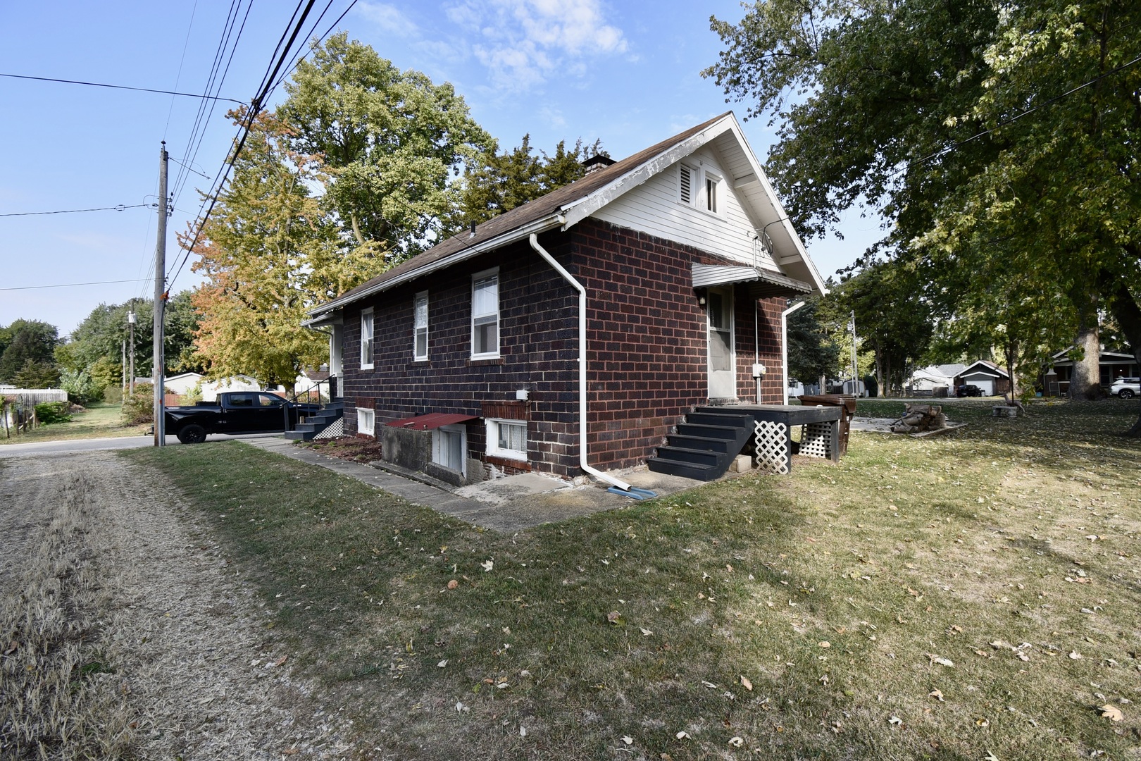 116 North Maple Street Clinton, IL 61727 - Photo 2 of 14 a view of a house with a patio
