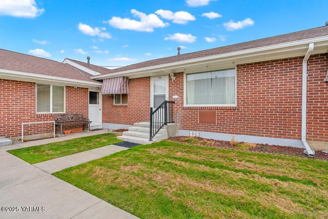 a view of a backyard with a garden