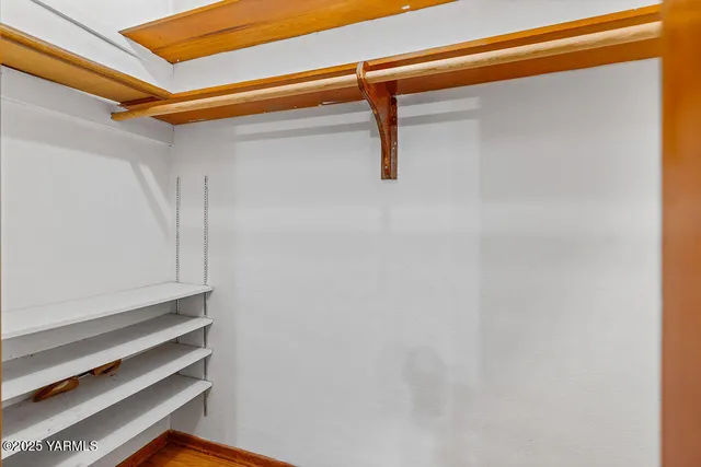 a view of a room with racks on the wall