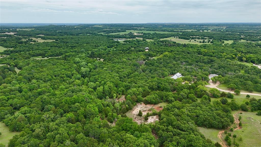 Tbd Big Tree Road Montague, TX 76251 - Photo 29 of 30 an aerial view of residential houses with outdoor space and trees