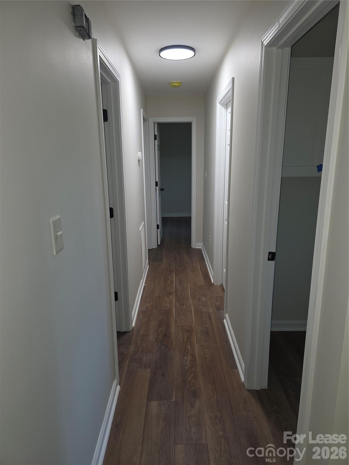 5710 Unionville Road Monroe, NC 28110 - Photo 8 of 18 a view of a hallway with wooden floor