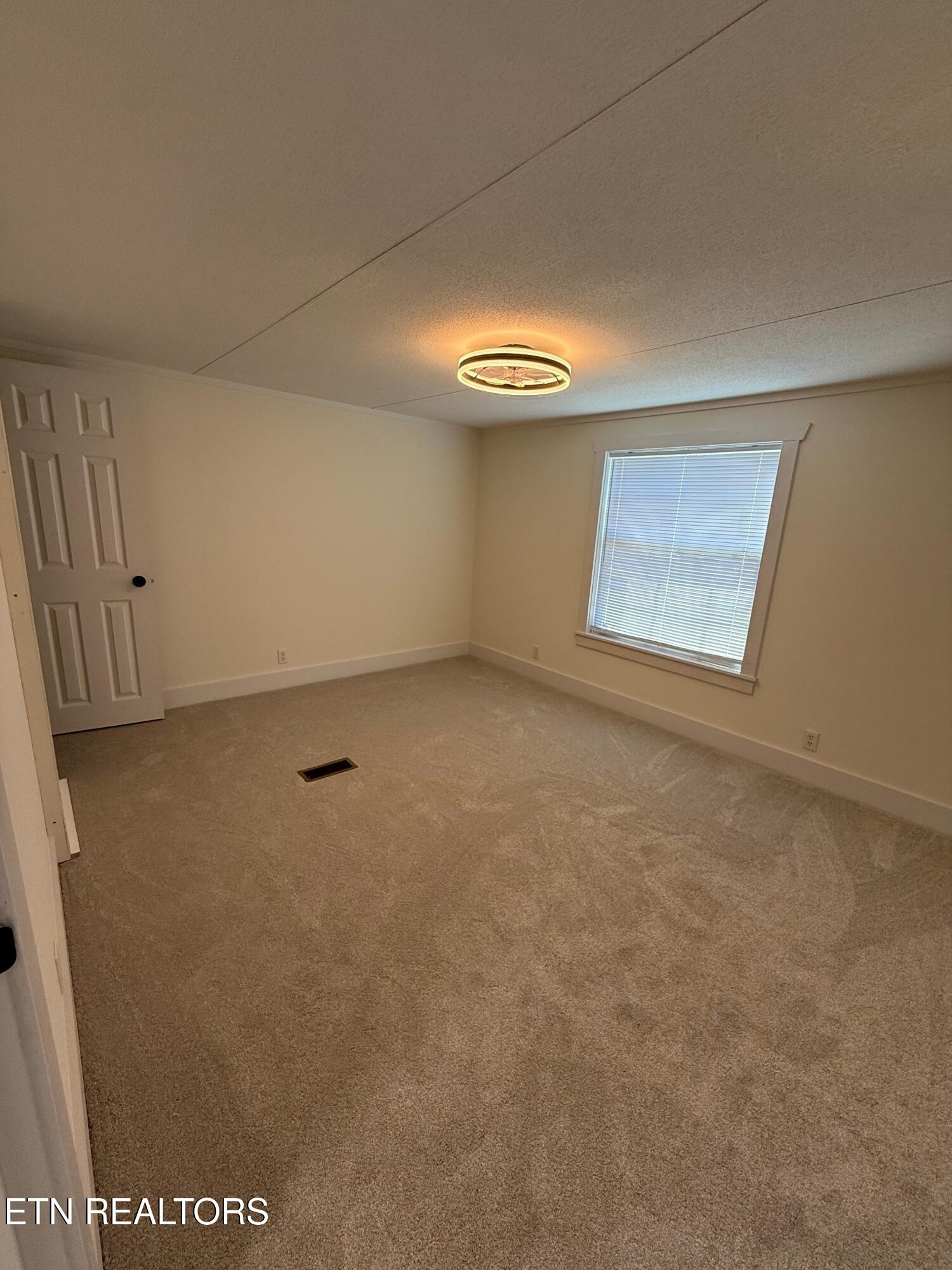 9544 Raccoon Woods Road Heiskell, TN 37754 - Photo 13 of 19 Guest Bedroom