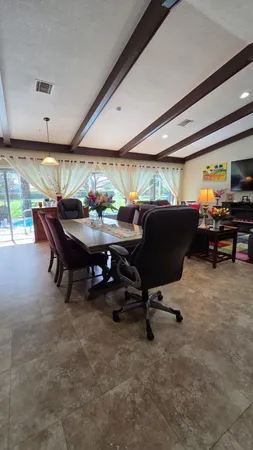 a bathroom with a bathtub sink and mirror