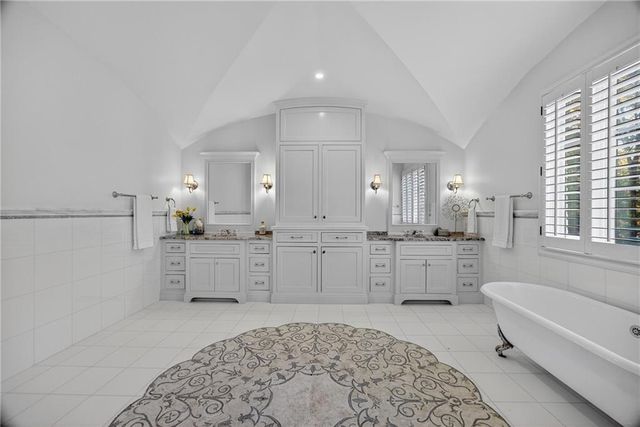 a bathroom with a sink and mirror