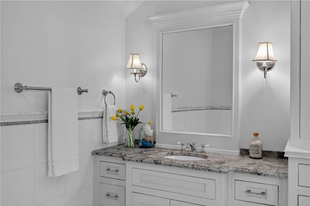 a view of a swimming pool with a lounge chairs