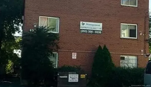 a front view of a house with yard