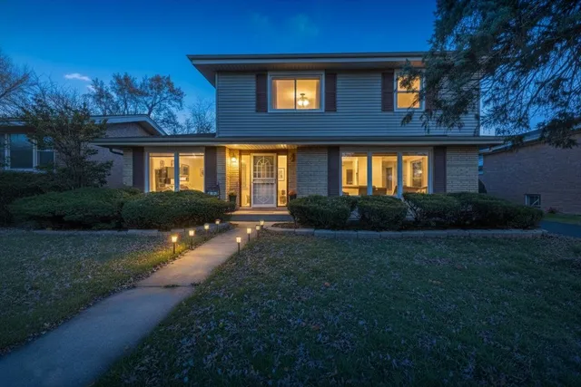 a house view with a garden space