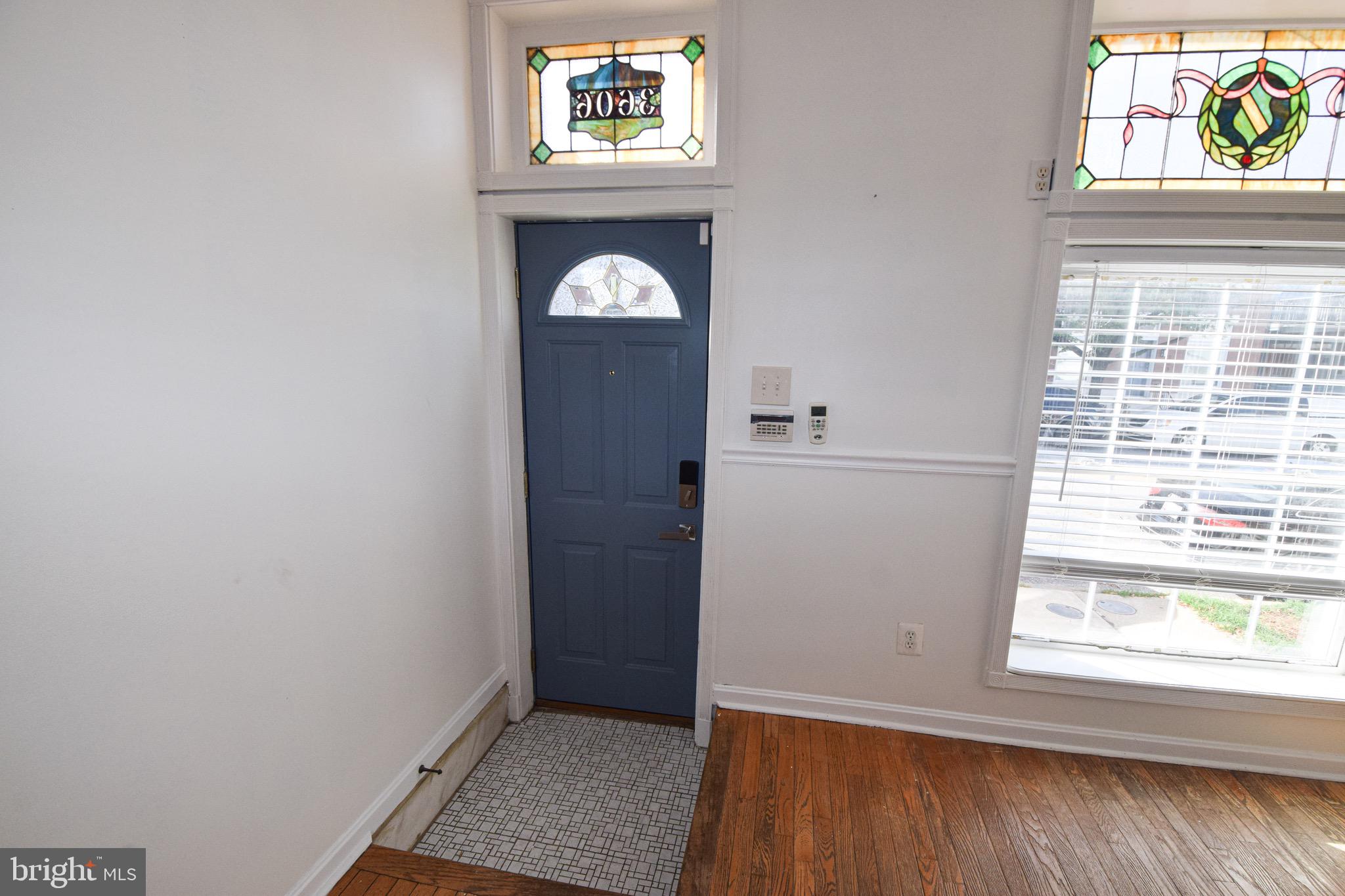 3606 Hudson Street Baltimore, MD 21224 - Photo 2 of 52 an empty room with windows