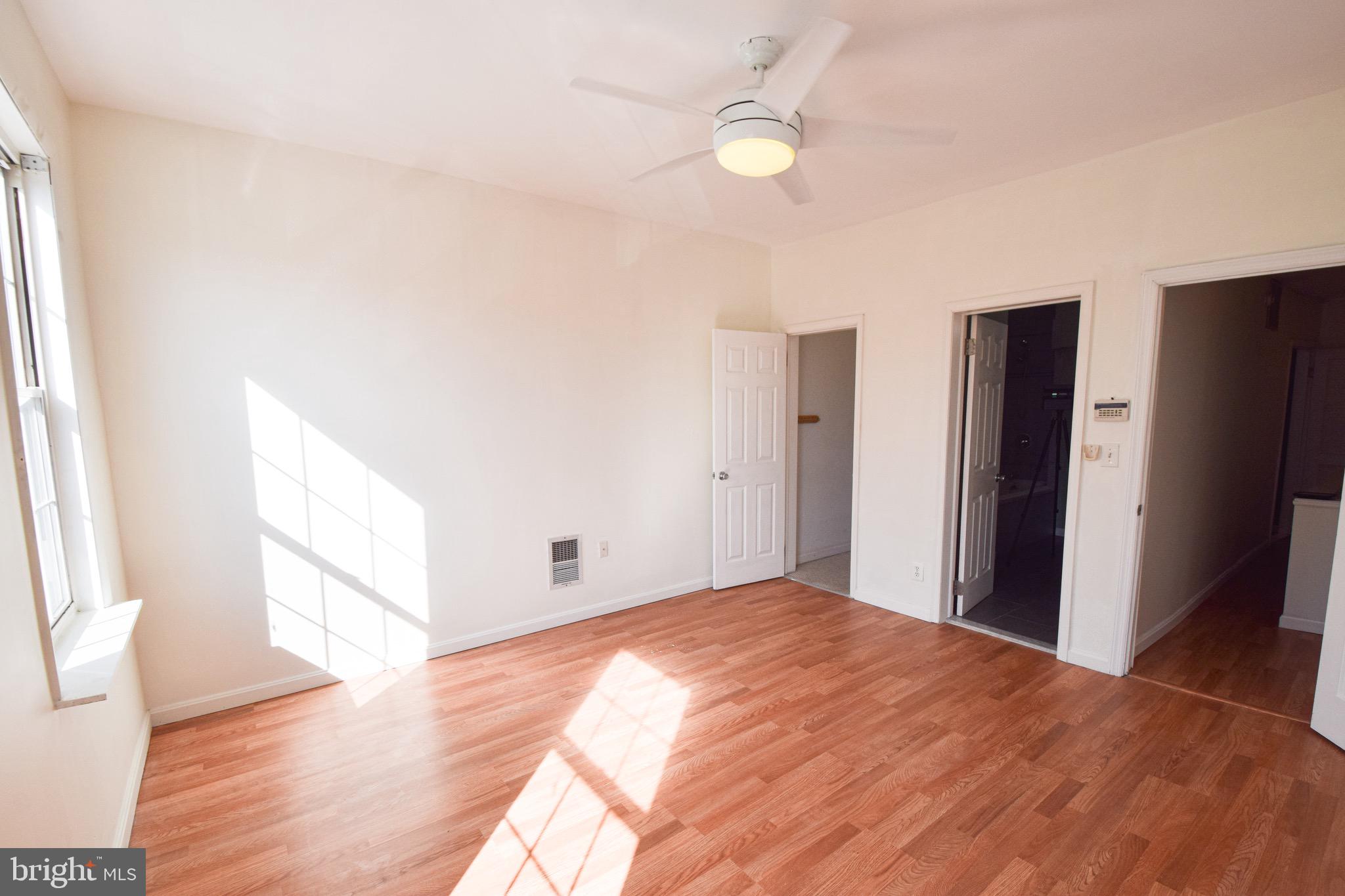 3606 Hudson Street Baltimore, MD 21224 - Photo 21 of 52 a view of empty room with wooden floor