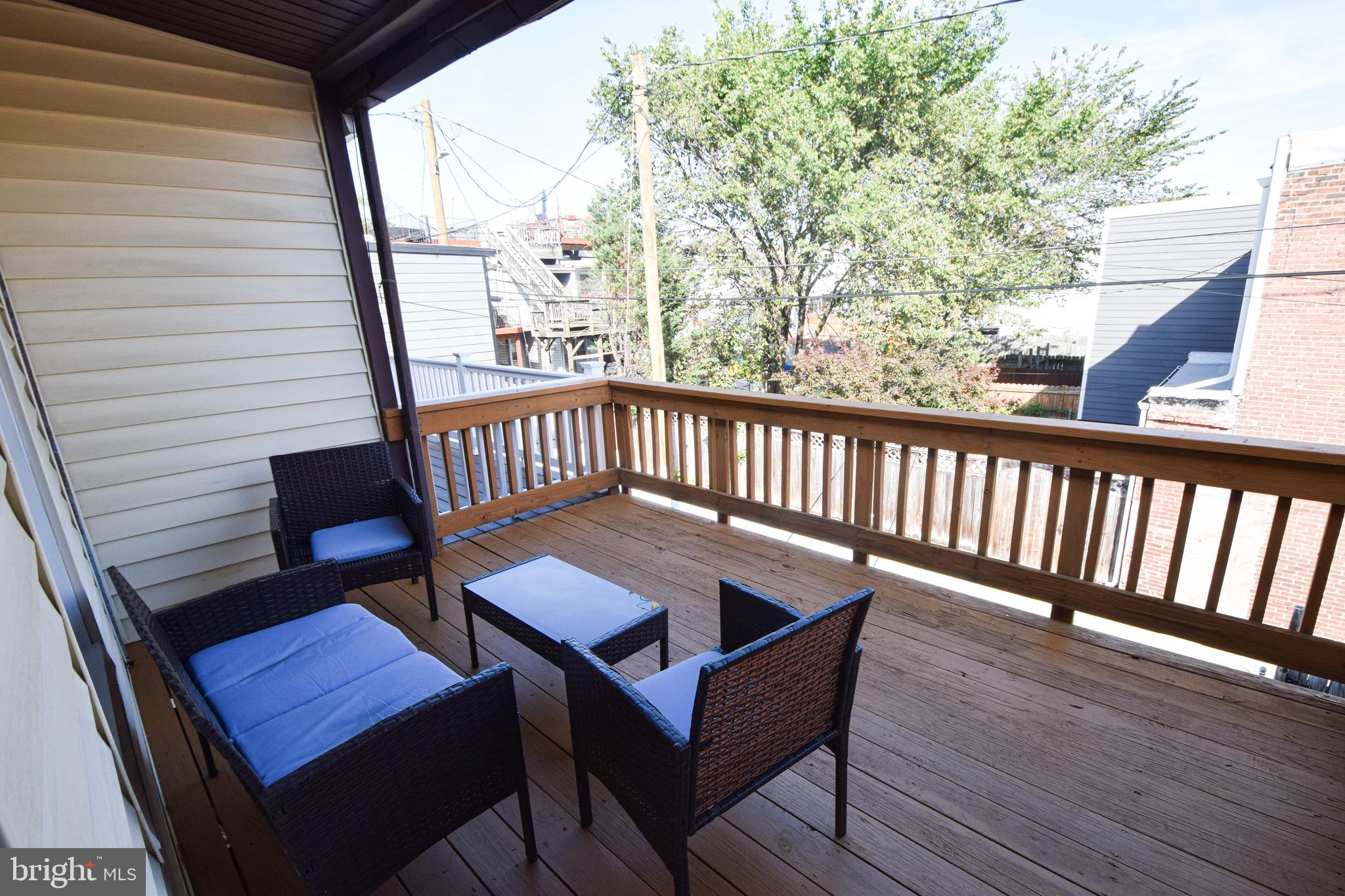 3606 Hudson Street Baltimore, MD 21224 - Photo 29 of 52 a view of a two chairs in the balcony
