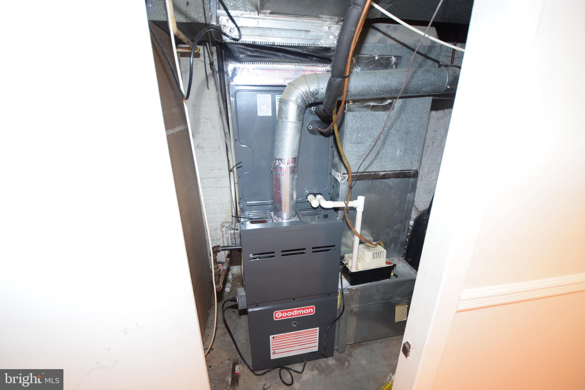 3606 Hudson Street Baltimore, MD 21224 - Photo 39 of 52 a living room with furniture and a mirror