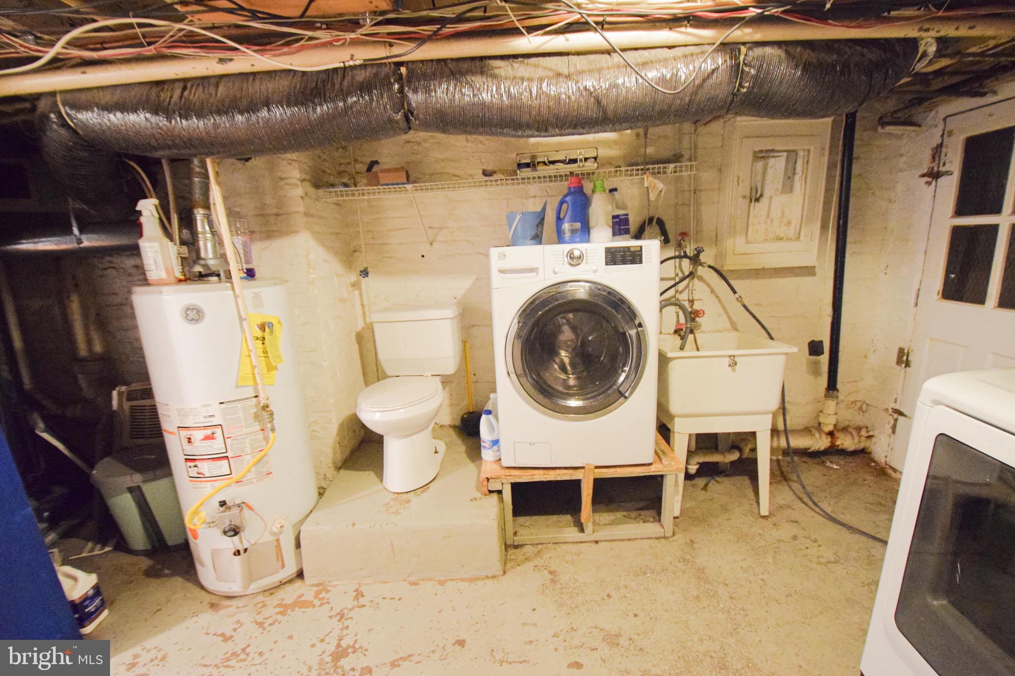3606 Hudson Street Baltimore, MD 21224 - Photo 42 of 52 a utility room with dryer and washer