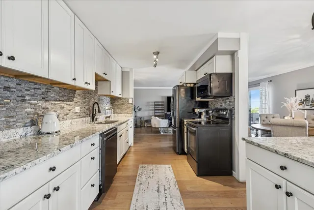 a large kitchen with cabinets
