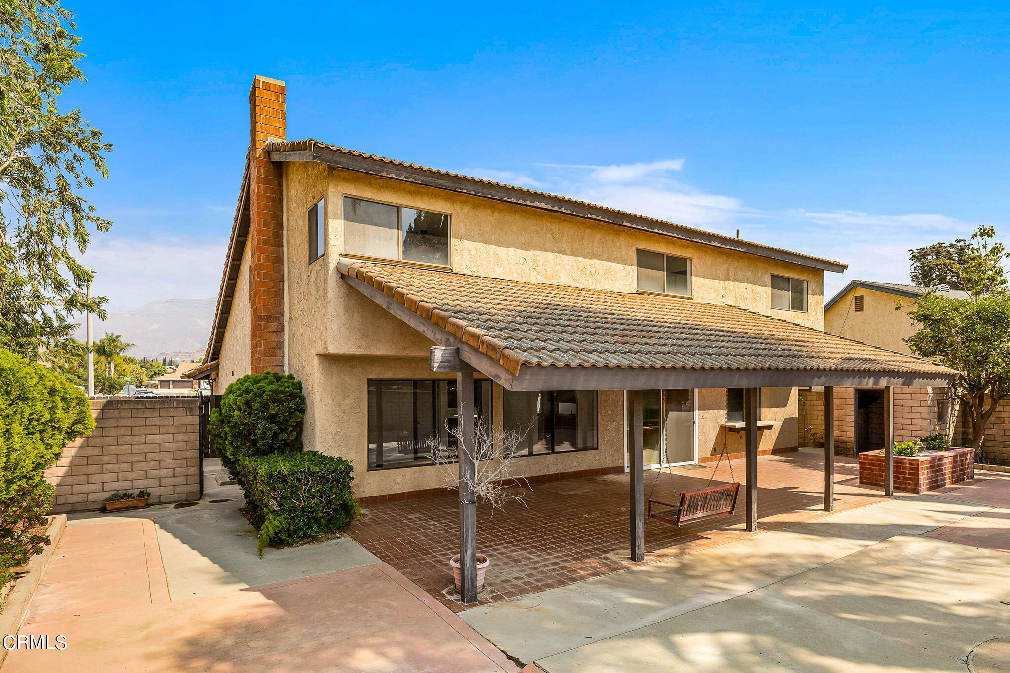 1006 Amber Drive Santa Paula, CA 93060 - Photo 31 of 37 a backyard of a house with yard and outdoor seating