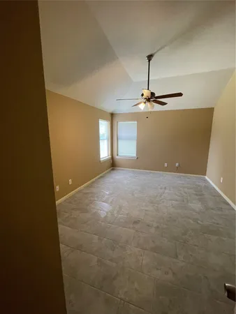 a view of a room with a window