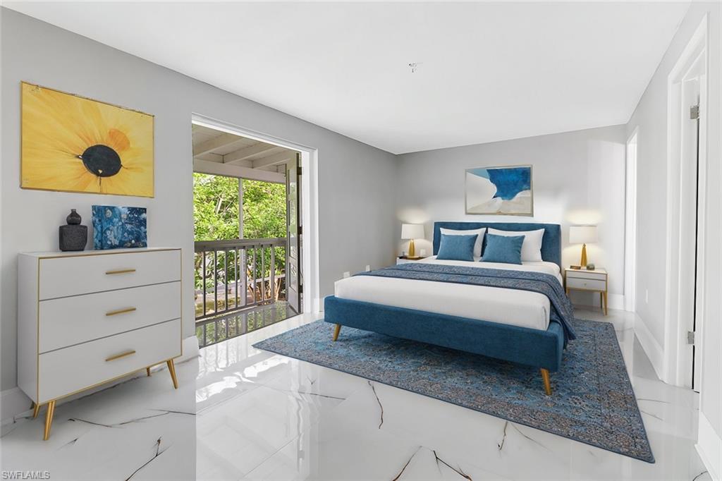 15 Watercolor Way, Unit 15 Naples, FL 34113 - Photo 2 of 29 a bedroom with a bed and a window