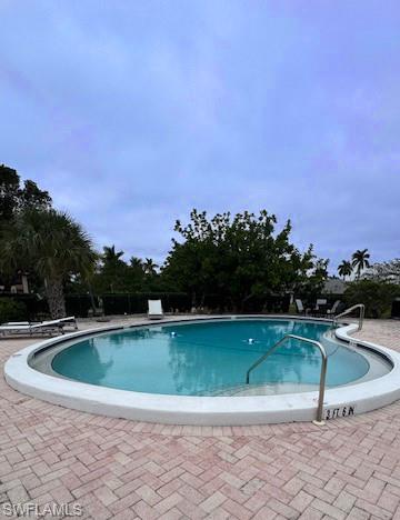 15 Watercolor Way, Unit 15 Naples, FL 34113 - Photo 25 of 29 a view of swimming pool