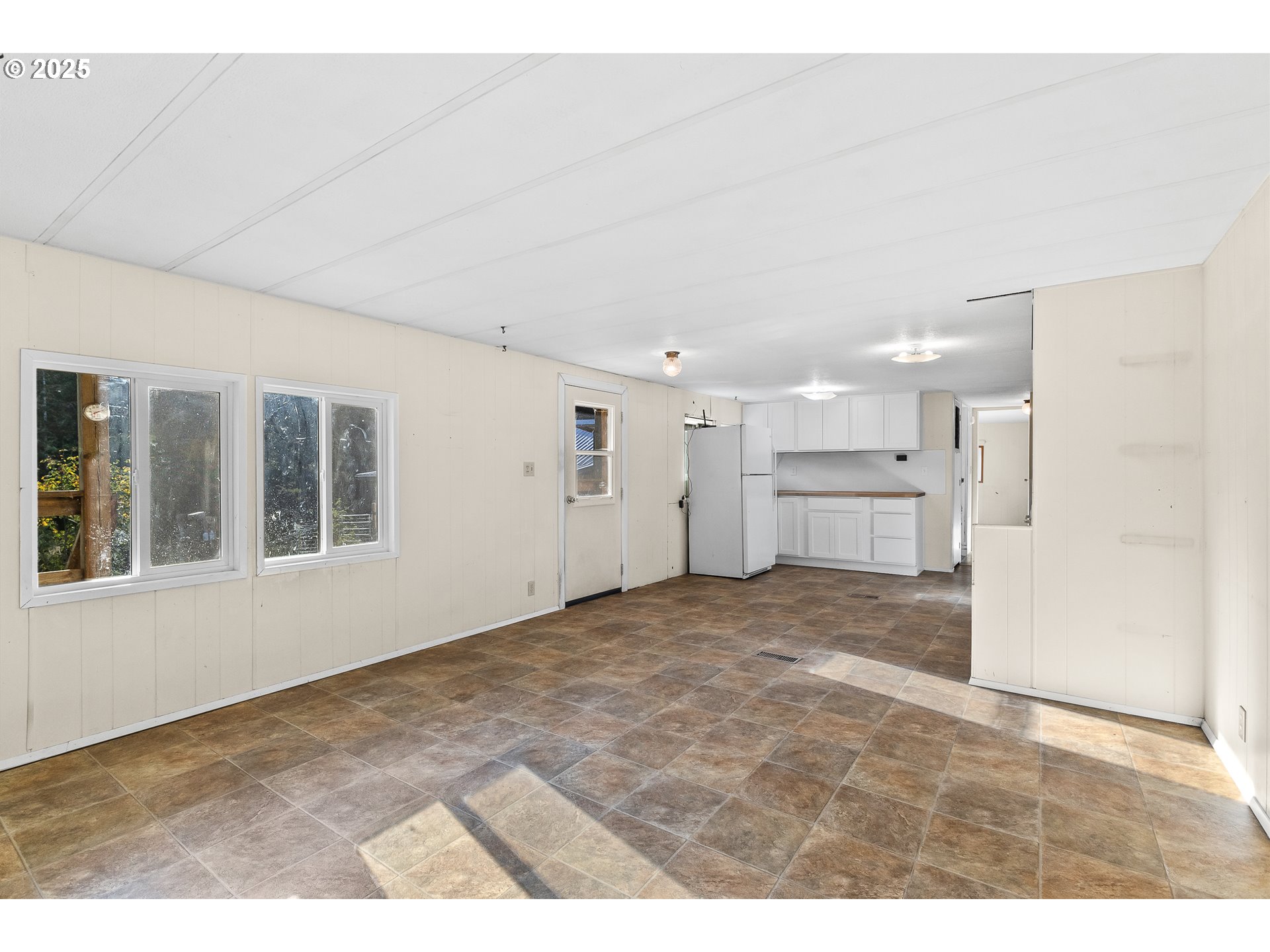 15779 Highway 42 Myrtle Point, OR 97458 - Photo 6 of 33 a view of an empty room with a kitchen