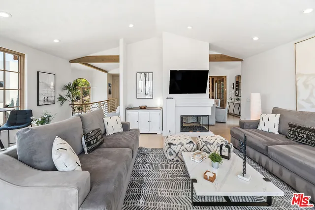 a bathroom with a granite countertop toilet a sink and a bathtub