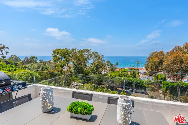a bathroom with a sink toilet and a mirror
