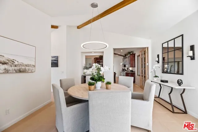 a view of balcony with two large windows