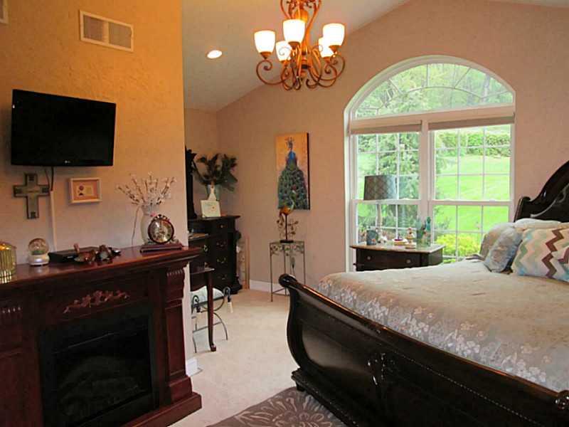 6938 Mellon Road Export, PA 15632 - Photo 10 of 24 Master Bedroom. DRAMATIC VAULTED CEILINGS ACCENT THIS 1ST FLOOR MASTER BEDROOM