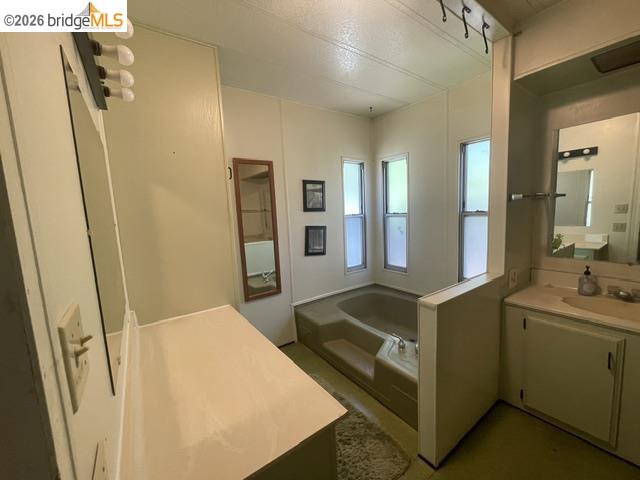 16629 Allison Way, Unit 4 Sonora, CA 95370 - Photo 18 of 25 a bathroom with sink and mirror