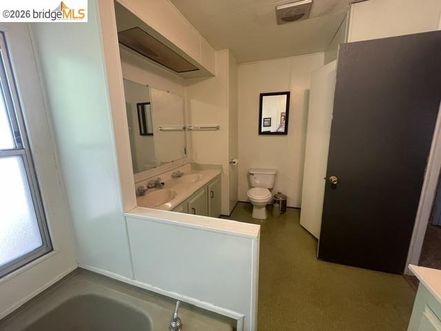 16629 Allison Way, Unit 4 Sonora, CA 95370 - Photo 20 of 25 a bathroom with a sink and a mirror