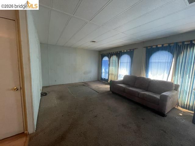 16629 Allison Way, Unit 4 Sonora, CA 95370 - Photo 2 of 25 a living room with furniture and a couch