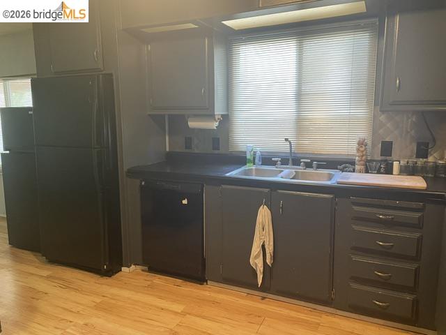 16629 Allison Way, Unit 4 Sonora, CA 95370 - Photo 4 of 25 a bathroom with a granite countertop sink and a mirror