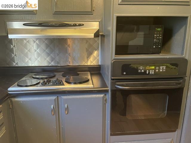16629 Allison Way, Unit 4 Sonora, CA 95370 - Photo 10 of 25 a stove top oven sitting inside of a kitchen