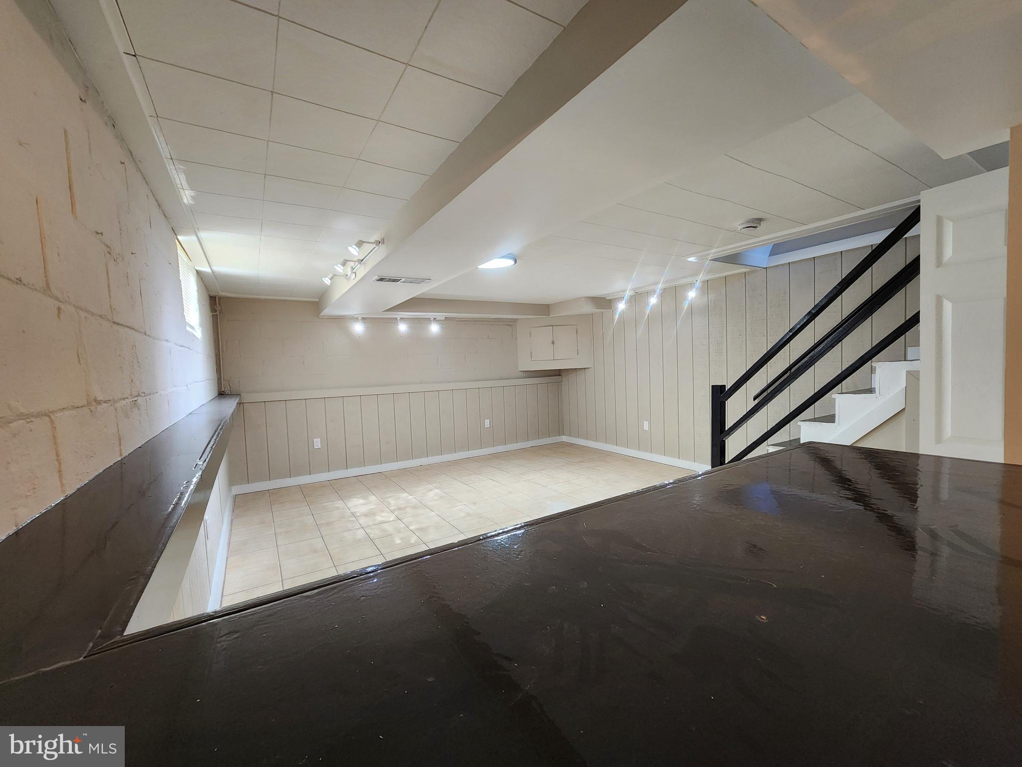 1925 Ewald Avenue Baltimore, MD 21222 - Photo 22 of 29 a view of an empty room with a window