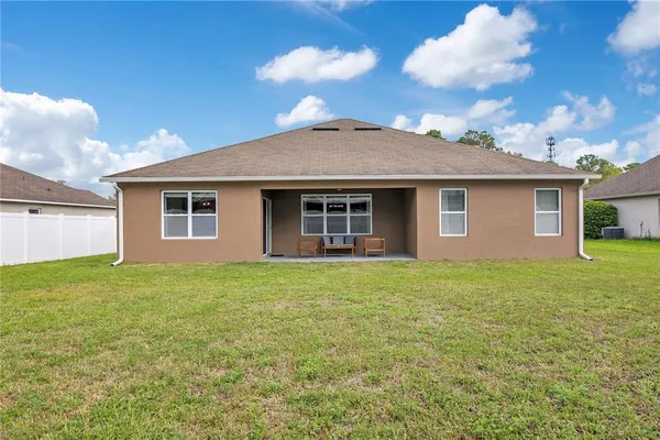 a view of a house with a big yard