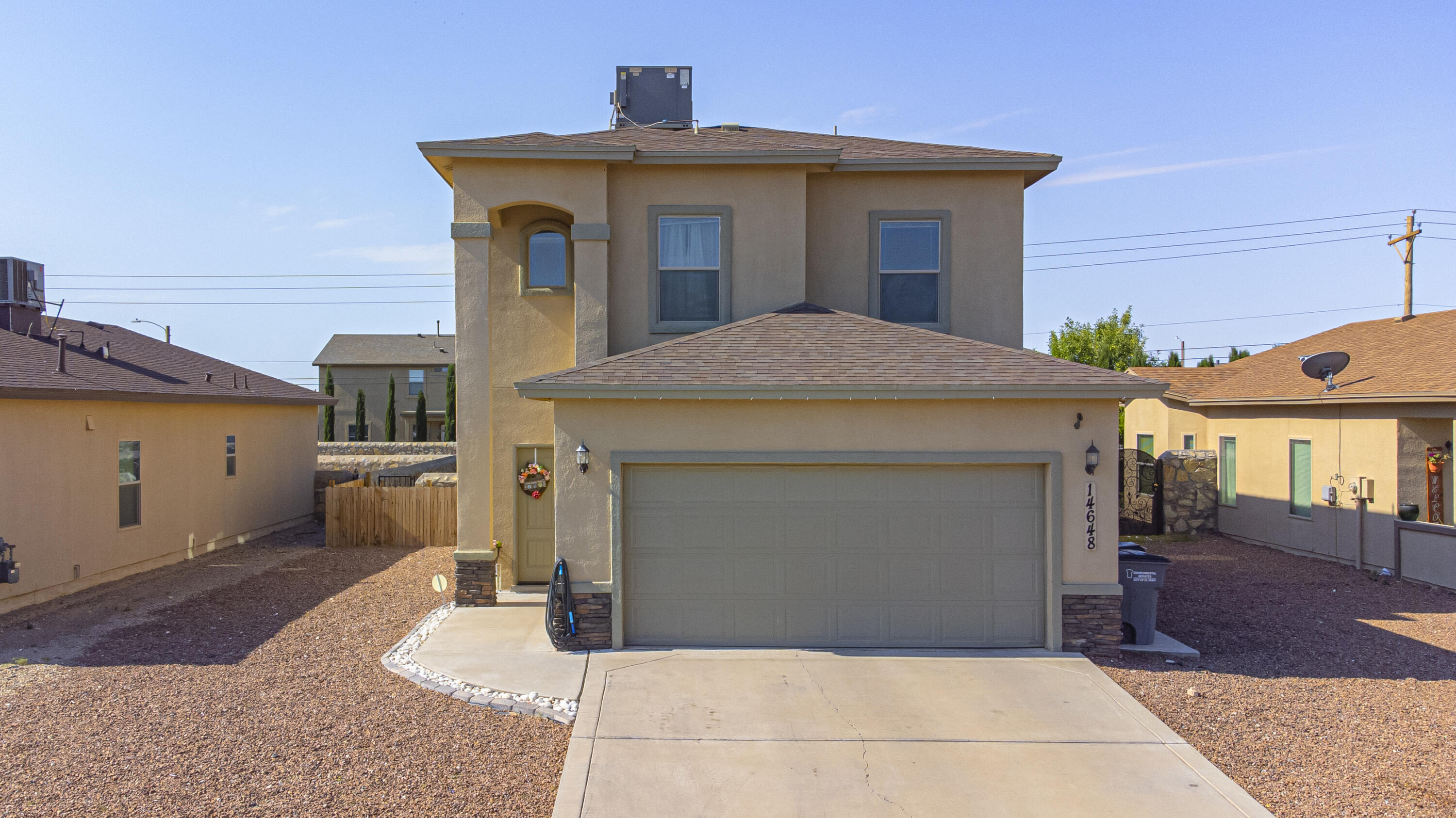 14648 Randall Cunningham El Paso, TX 79938 - Photo 1 of 1 a front view of a house with yard